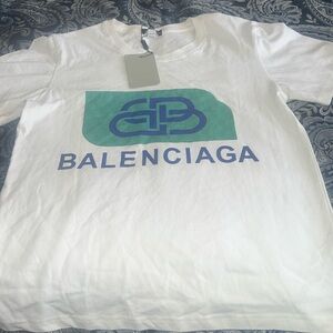 White short sleeve balenciaga T-shirt, size small with a green and blue logo.